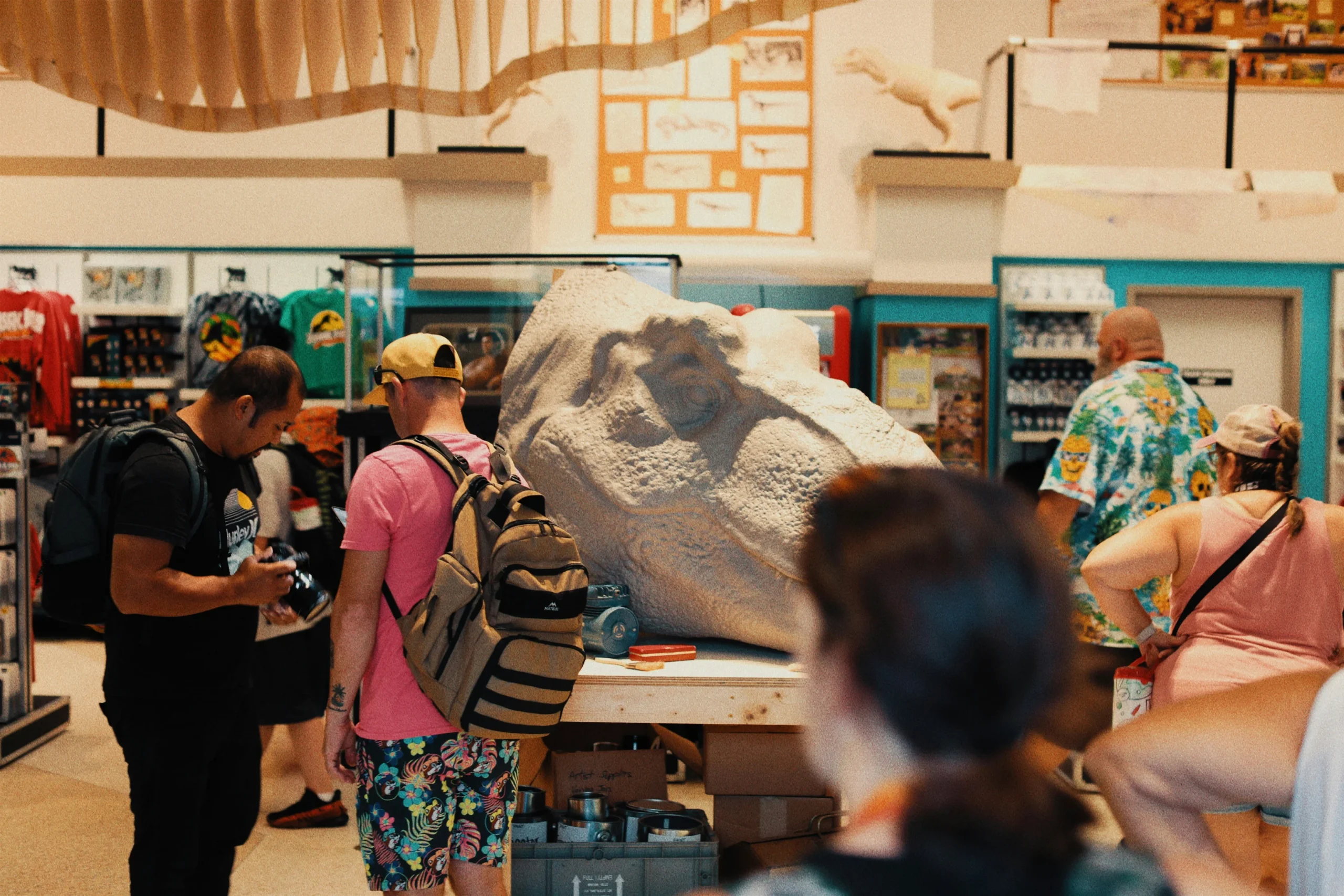 Visitors looking around a museum attraction